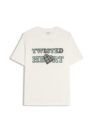 White short-sleeve T-shirt with "TWISTED HEART" text, featuring plaid pattern letters and a plaid heart replacing the letter "A" in "HEART."