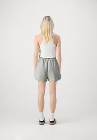 GAP DOLPHIN HEM - Teplákové kalhoty - heather grey