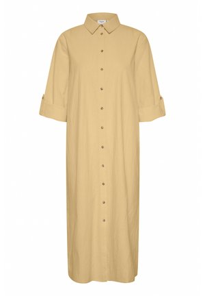 Svijetlo bež haljina do koljena, s oštrom kragnom, prednjim zatvaranjem na dugmad, dugim rukavima koji se mogu rolati i glatkom teksturom tkanine.