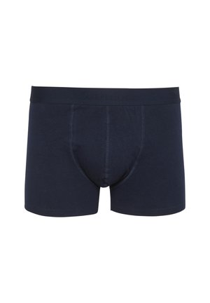 Tumed sinine puuvillane bokserite aluspesu, mis istub mugavalt, omab pehmet vöökohta ja kontrastset õmblusdetaili. Ilma mustrite või graafikata.