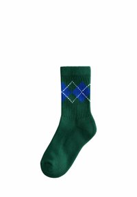 Grüne Socke mit einem Argyle-Muster in Blau, Weiß und hellgrün, mit geripptem Textur am oberen Ende und glattem Finish im gesamten Bereich.