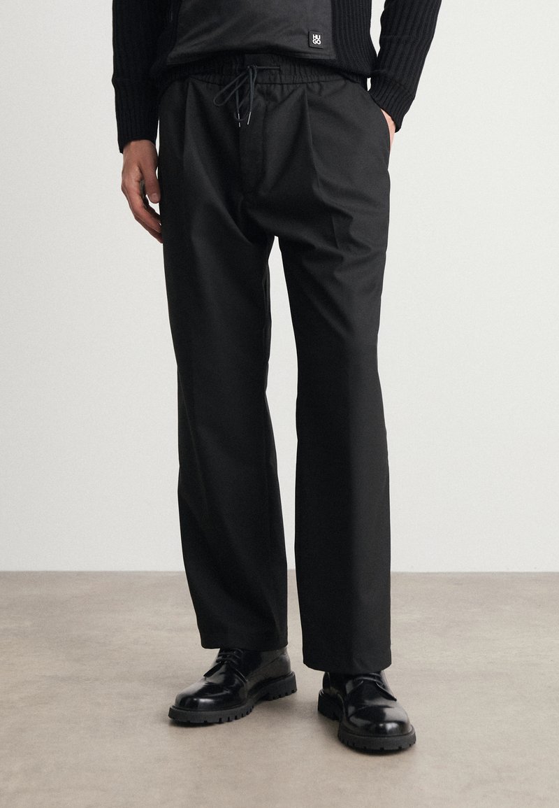 HUGO RAVI - Pantalon classique - black