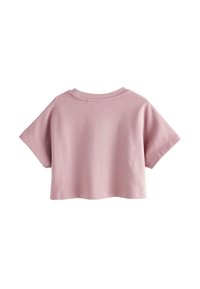 Roze cropped T-shirt gemaakt van zachte katoen. Heeft korte mouwen, een ronde hals en een gladde structuur met minimale stikdetails.