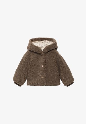 Giacca in pile marrone con cappuccio, caratterizzata da una chiusura a bottoni, polsini a costine e una fodera a pois. Texture morbida con una forma leggermente squadrata.