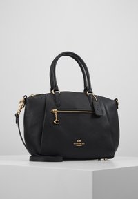 Borsa a tracolla in pelle nera con finitura testurizzata, manici superiori doppi, accessori in oro e una tasca con zip sul davanti. Inclusa tracolla removibile.