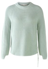 Pull en maille vert clair avec des manches longues, un col rond, un motif côtelé vertical et une fermeture éclair sur le côté avec un tirette.