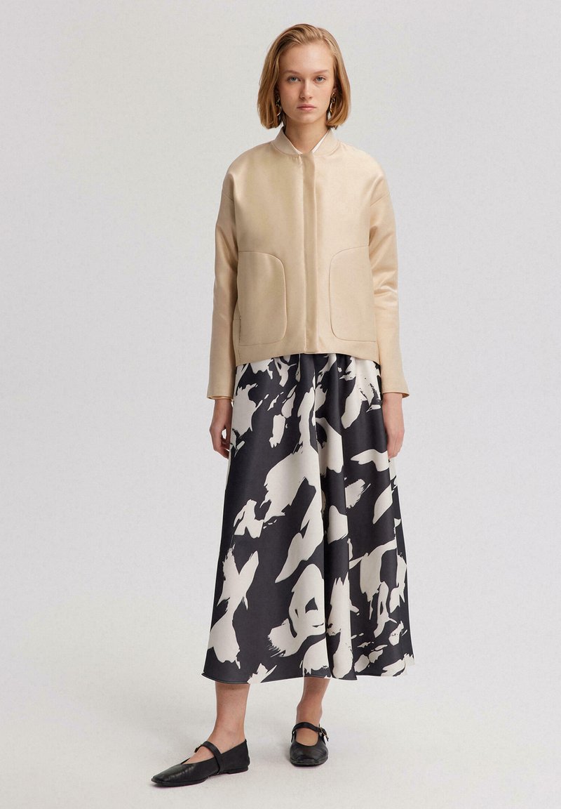 Touché Privé Jas graniet