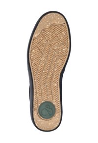 Shoe sole with tan textured tread, black edge, and green circular logo near heel, size 41 marked on sole.