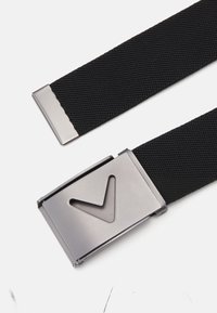 Black woven belt with a sleek metal buckle featuring a cutout V design. The fabric is textured, and the buckle has a matte finish.