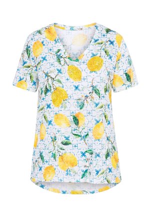 Valkoinen lyhythihainen V-aukolla varustettu paita, jossa on keltainen sitruuna- ja vihreä lehtikuvio sinisen laattamaisen taustan päällä.