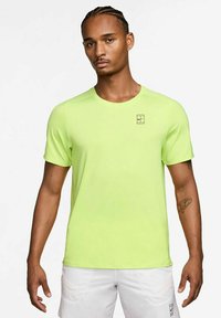 NIKECOURT ADVANTAGE TOP - T-shirt de sport - lt lemon twist