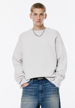 - Sweter