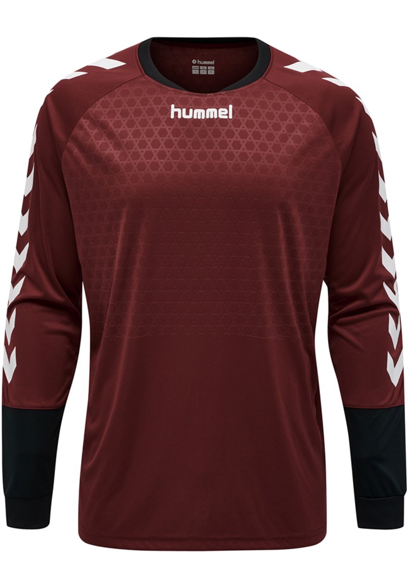 Maglia sportiva a maniche lunghe color marrone con un motivo tessurizzato, dettagli neri sulle maniche e chevron bianchi sulle spalle. Logo Hummel sulla parte frontale.