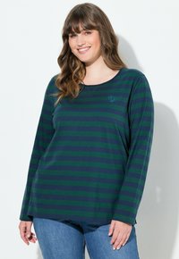 Langarm T-shirt met ronde hals in donkergroen en marineblauw met horizontale strepen. Voorzien van een klein geborduurd rozendetail. Gemaakt van zachte stof.