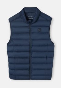 Chaleco sin mangas acolchado de color azul marino con cremallera frontal y parche de logo redondo en el lado izquierdo del pecho.