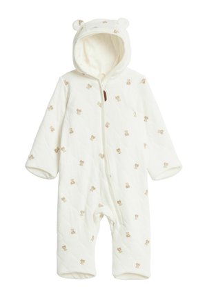 Kremfarvet babyheldragt med hætte og bjørneører, dekoreret med små bamsemønstre og lynlås foran.