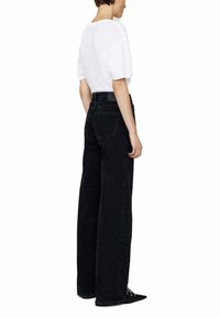 ANINE BING PANAMA - Jeans a zampa - nero