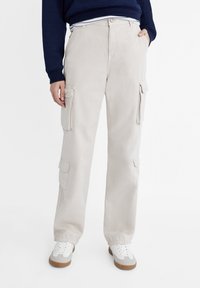 Stradivarius ADJUSTABLE WAIST - Hlačami s stranskimi žepi - beige