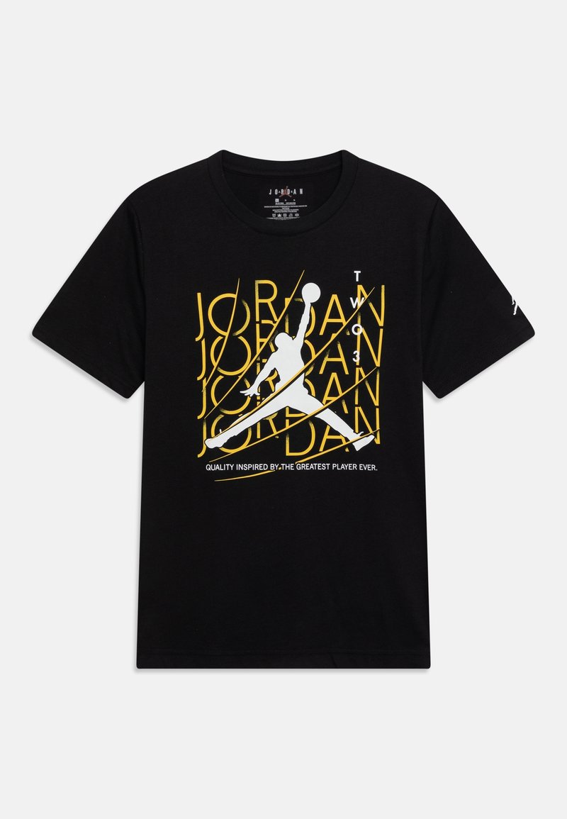 T-shirt en coton noir avec un graphique silhouette blanc d'un joueur de basketball, accompagné d'un texte jaune et blanc indiquant "JORDAN" et "T3."