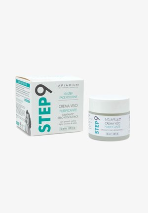 Barattolo e scatola della crema viso purificante Apiarium STEP 9, 50ml, etichettata come idratante e regolatrice del sebo, con propoli, salvia, tiglio e succo di aloe.