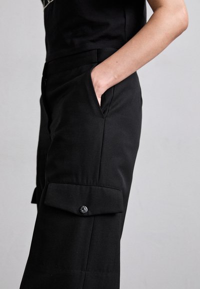 sandro JOSEPHY - Cargo trousers - noir