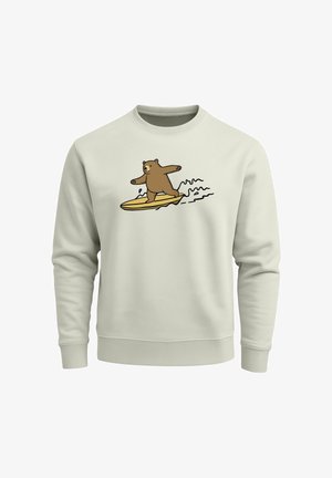 Hellgrauer Sweatshirt mit einem Cartoon-Bären, der auf einem gelben Surfbrett surft, umgeben von schwarz umrandeten Wellen und Details im Design.