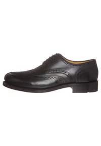 Sorte læder dress sko med brogue-detaljer, seks øjetter og rund tå; glat finish og mellemhøj stablet hæl.