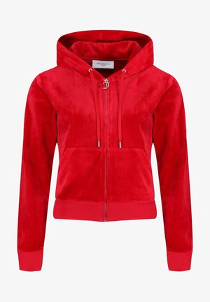 Rode ritsvest gemaakt van zacht, fluweelachtig materiaal. Heeft een capuchon met een trekkoord en voorzakken. Slim fit met geribbelde manchetten en onderrand.