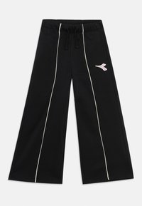 Schwarz, weit geschnittene Hose aus Baumwolle mit elastischem Bund, Kordelzug und weißen Seitenstreifen; verfügt über ein kleines pinkes Logo.