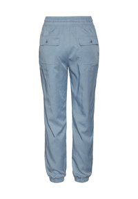 Vaaleansiniset, löysät housut, joissa on elastinen vyötärö, kaksi takataskua ja elastiset resorit nilkoissa. Sileä kankaan rakenne.