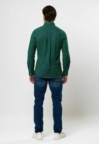 U.S. Polo Assn. ESMAR - Ing - rain forest