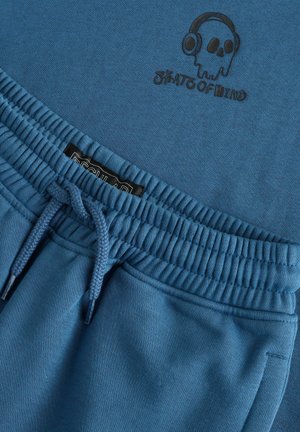 Blaues Sweatshirt mit einem Totenkopf-Logo, ausgestattet mit einem gerippten Kragen, einstellbarem Kordelzug-Taille und weichem, strukturiertem Stoff.