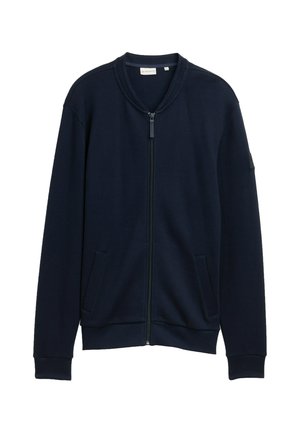 Marineblauw sweatvest met ritssluiting, gemaakt van een textuurstof, met geribde boorden aan de mouwen en zoom, en twee steekzakken aan de voorkant. Minimalistisch ontwerp met een ronde hals.