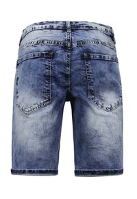 Lichtblauwe denim shorts met een vervaagde was, voorzien van een klassiek vijf-pocket ontwerp en opgerolde zoom. De achterkant heeft twee opgestikte zakken.