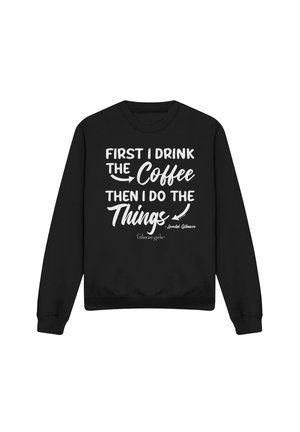 Black sweatshirt with white text reading, "First I drink the coffee, then I do the things," attributed to Lorelai Gilmore, Gilmore Girls.
