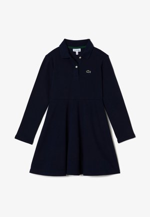 Robe polo bleu marine à manches longues pour filles avec col, patte à deux boutons, jupe évasée et petit logo crocodile vert brodé sur la poitrine.