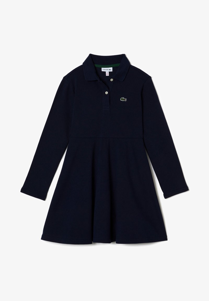 Robe polo bleu marine à manches longues pour filles avec col, patte à deux boutons, jupe évasée et petit logo crocodile vert brodé sur la poitrine.