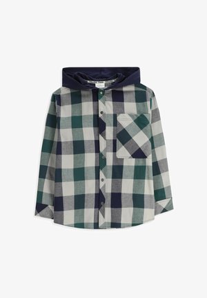 Koszula w kratę z niebieskim kapturem. Charakteryzuje się zielonymi, szarymi i niebieskimi kwadratami. Posiada kieszeń na piersi oraz standardowy kołnierzyk.