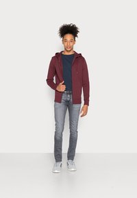 Diesel SLEENKER - Calças de ganga de corte skinny - 09c68 02
