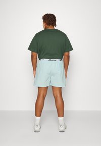 Ellesse TEYNOR - Plavecké šortky - aqua