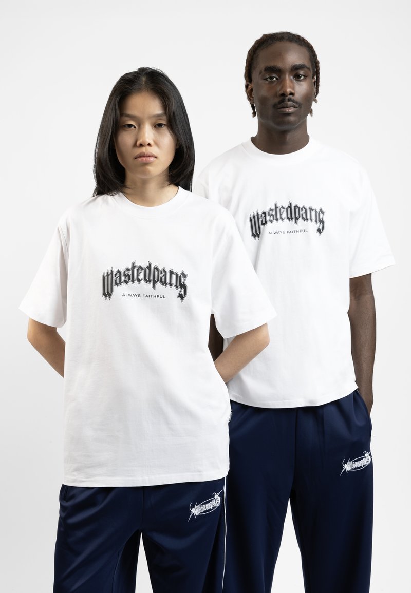 White cotton t-shirts featuring black printed text "Wastedpang" and "Always Faithful" worn with navy blue sweatpants. Plain design, relaxed fit.