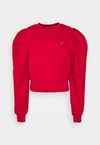 Sudadera roja corta con mangas largas abullonadas. Cuenta con un escote redondo y un pequeño detalle bordado colorido en el pecho.