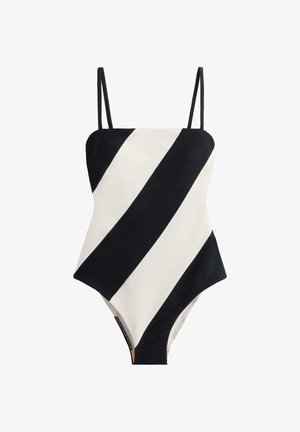 Costume intero a righe bianche e nere con scollo quadrato, spalline sottili e silhouette aderente. Tessuto strutturato con audaci linee diagonali.