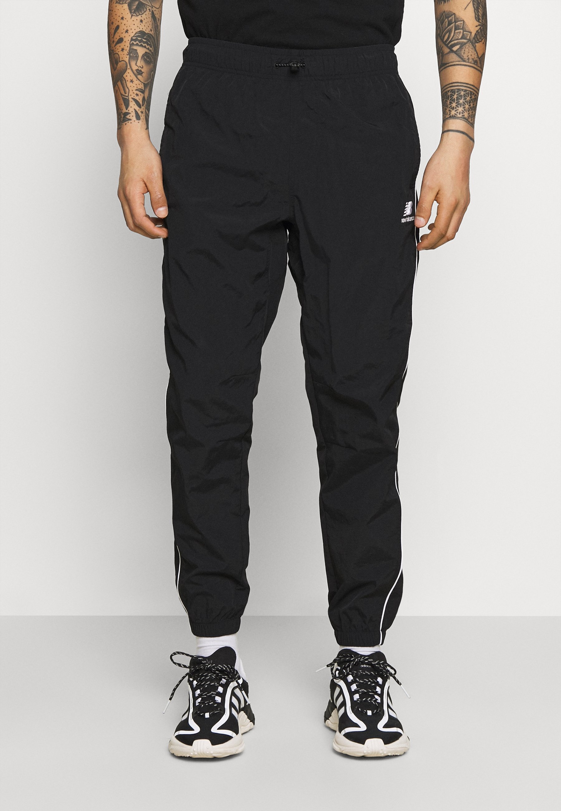 New Balance ATHLETICS WIND PANT 