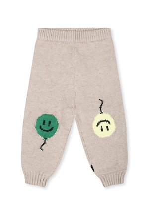 Pantaloni in maglia beige con due motivi di palloni colorati: un pallone verde con una faccina sorridente e un pallone giallo con una faccia neutra.