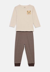 Beige long-sleeve shirt with a brown bear face print; brown and cream striped pajama pants with elastic cuffs. Soft cotton fabric.
