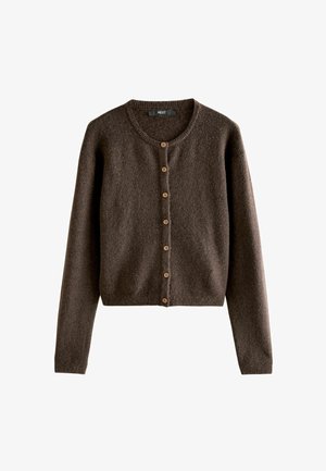 Pruun kardigan, mis on valmistatud tekstuurses kangas, millel on pikad varrukad, ümar kaelus ja rida ümmarguseid heledat värvi nuppe ees.