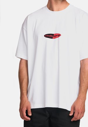 White cotton t-shirt featuring a red and black oval logo on the chest. The design has short sleeves and a relaxed fit.