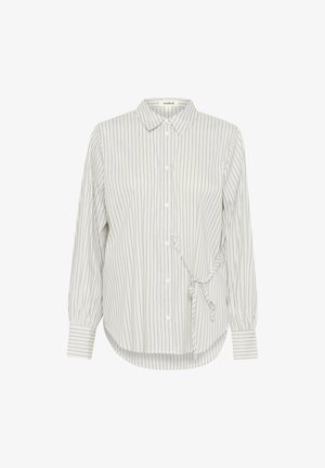 Button-up-paita vaaleanvihreillä ja valkoisilla raidoilla, pitkät hihat, pyöristetty helma ja solmittava yksityiskohta vyötäröllä.