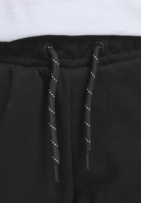 Jack & Jones Junior JJIAIR - Teplákové kalhoty - black